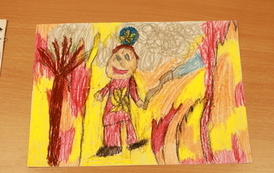 Kolorowa praca pokazująca czerwone płomienie na ż&oacute;łtym tle. 